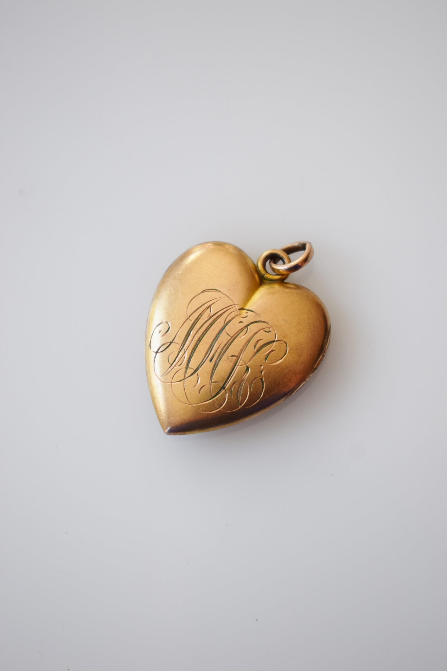 Antique Gold Heart Locket with Rhinestone Starburst