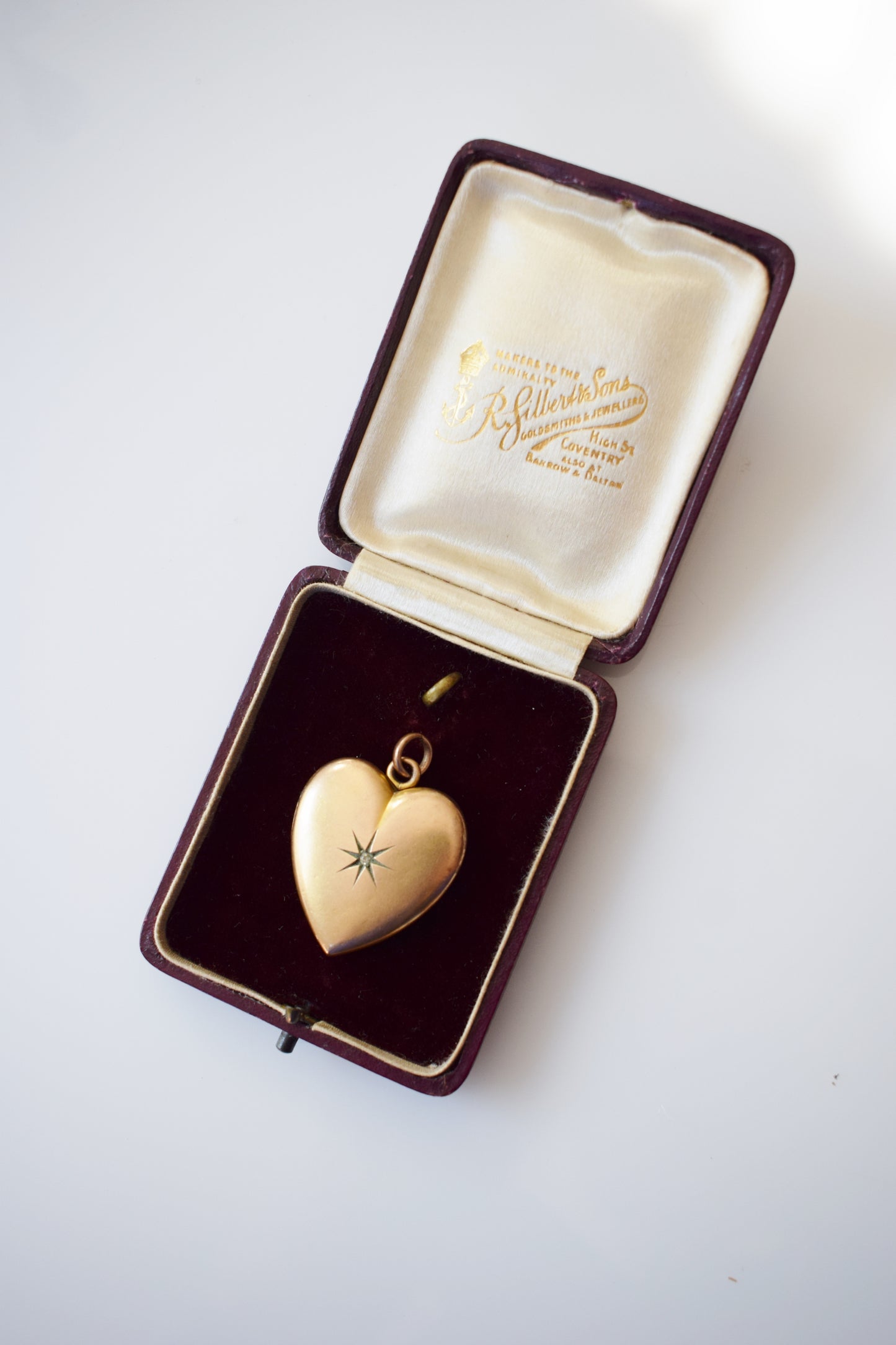 Antique Gold Heart Locket with Rhinestone Starburst