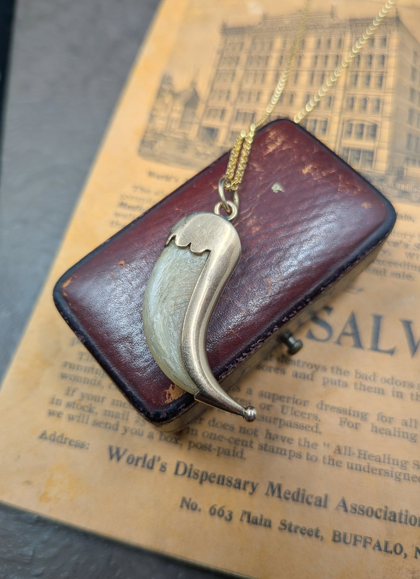 Victorian Gold-Wrapped Claw Pendant