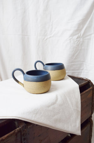 Pair of Vintage Hand Cast Clay Mugs