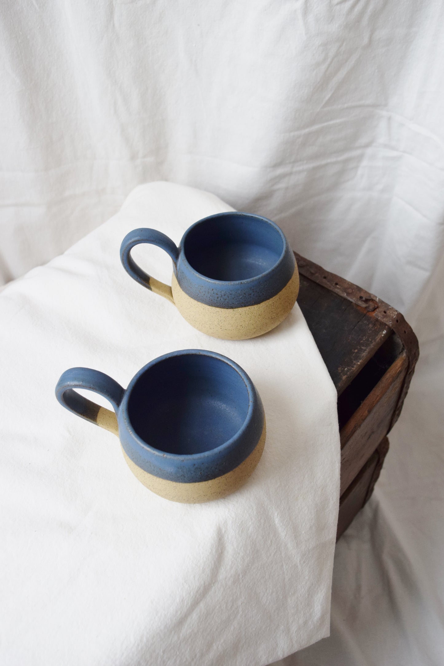 Pair of Vintage Hand Cast Clay Mugs