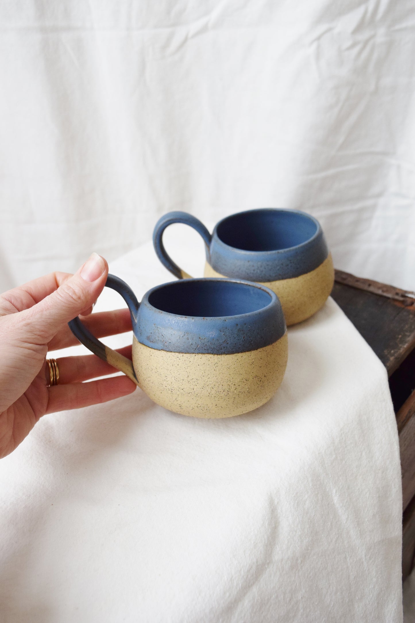 Pair of Vintage Hand Cast Clay Mugs