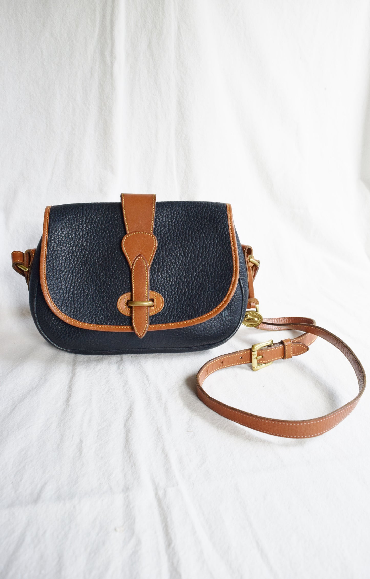 Vintage Dooney & Bourke Crossbody Saddle Bag in Navy and British Tan | All Weather Leather