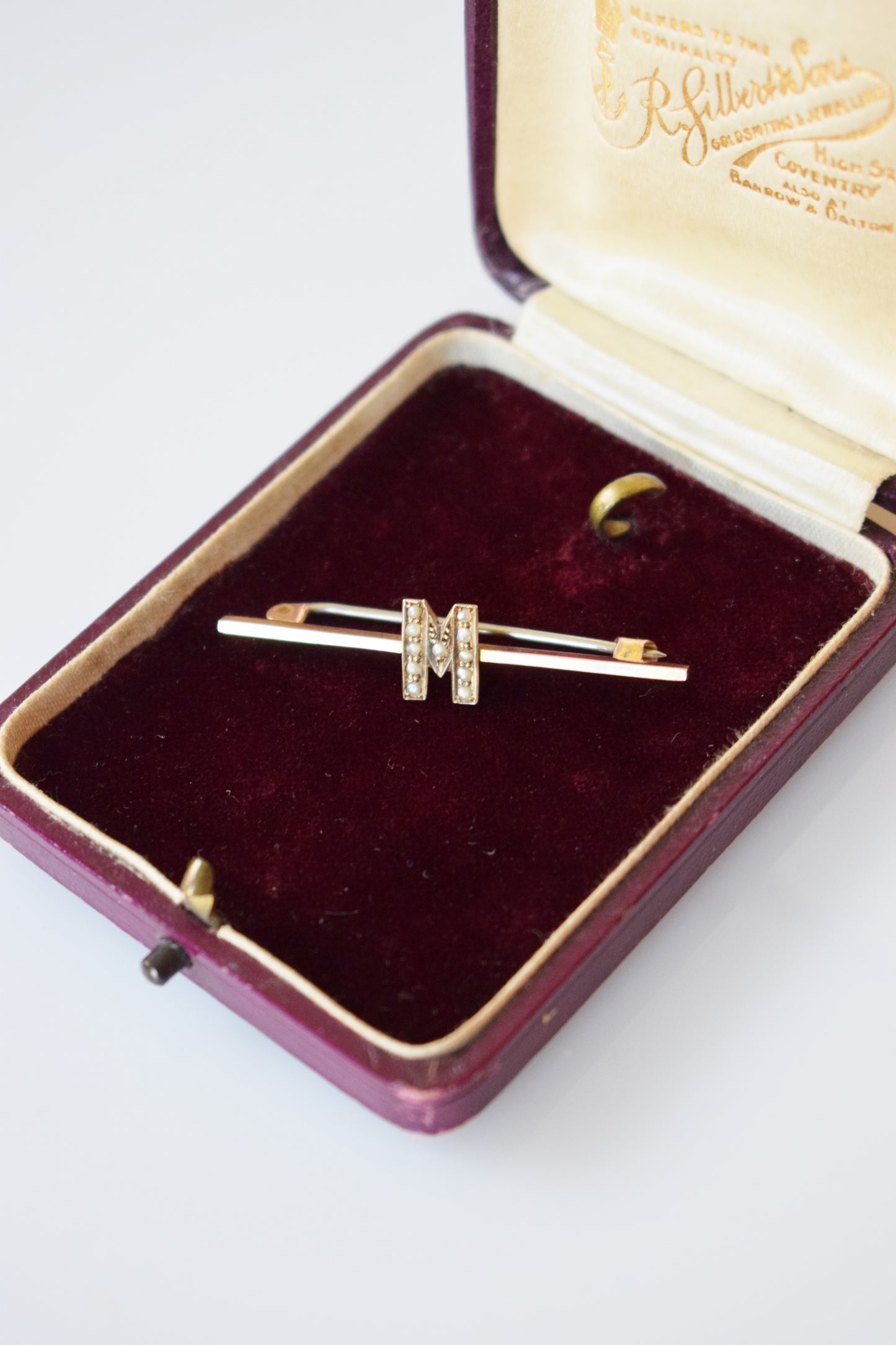 Antique 9kt Gold and Seed Pearl "M" Bar Pin