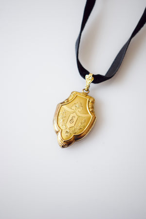 Vintage Gold Shield-Form Locket with Initial "E"